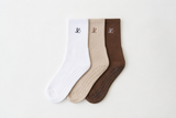 all three luméa pilates sock colours flatlay: pure, taupe, cacao