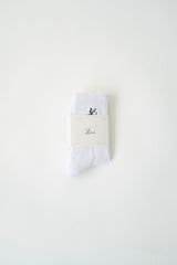 luméa pure pilates sock in its packaging