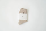luméa taupe pilates sock packaging, horizontal